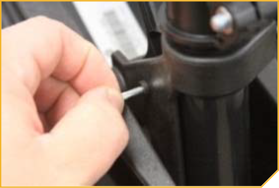 T-Bar_Replacement-_Knurls_exposed_removing_Tilt_Lever_Pin_by_hand.png