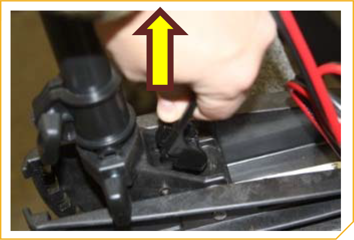 T-Bar_Replacement-_Pulling_up_on_Tilt_Lever_to_allow_the_bracket_to_tilt.png