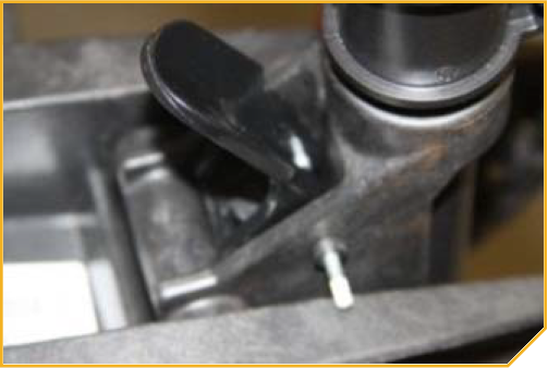 T-Bar_Replacement-__Tilt_Lever_Pin_ready_to_be_driven_into_place.png